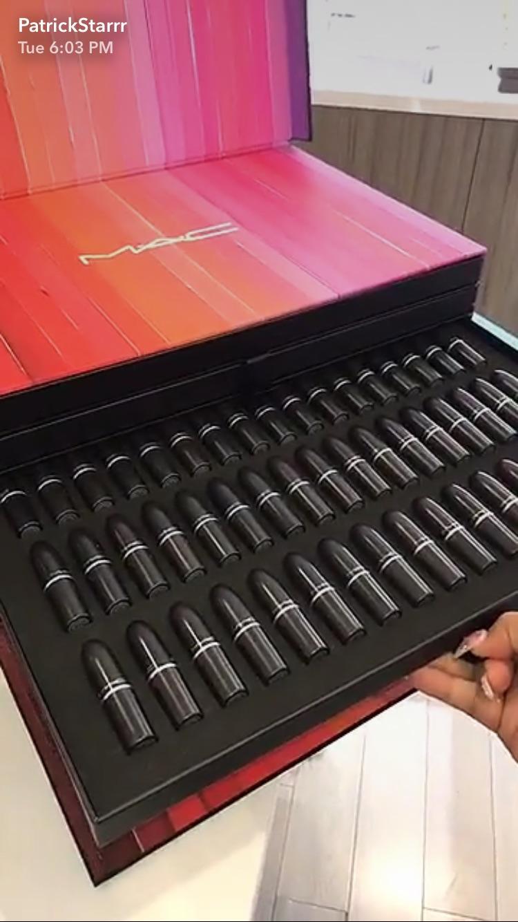 A MAC Cosmetics PR mailer, dense foam-style inserts holding dozens of
individual products securely
